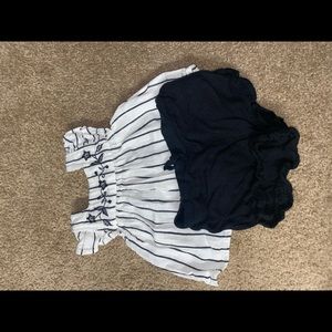 Striped shirt with Black shorts